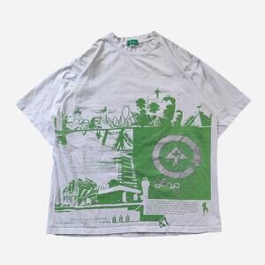 Y2K LRG Tee with green graphic of a cityscape with a circular logo